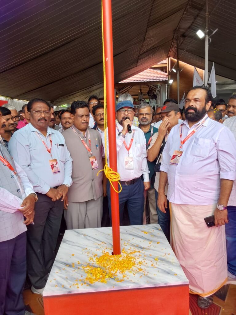 in LICAOI 7Th All India Conferance opening session All India President Com. Surajith Kumar Bose Hoiesting Flag at Kozhikod.
